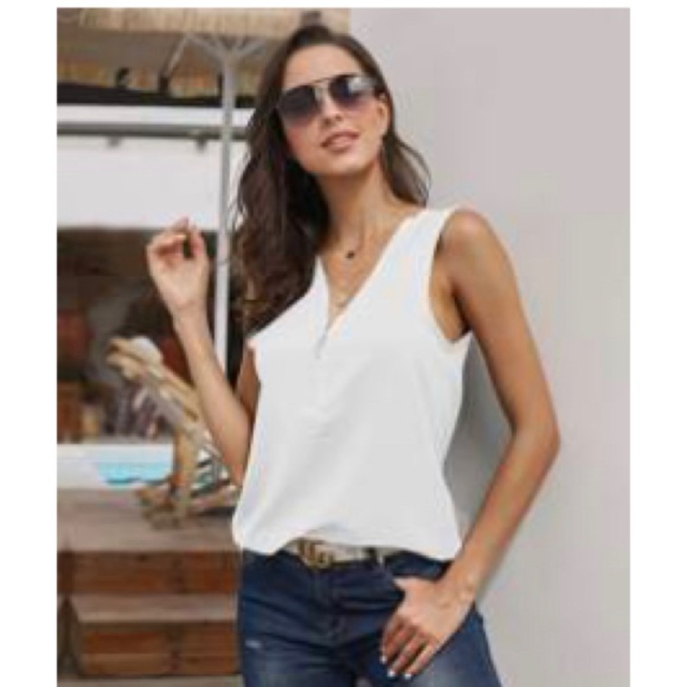 Half zip white sleeveless shirt, size small